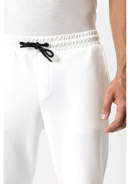 Beyaz Regular Fit Pamuklu Beli Bağlamalı Jogger Pantolon modelleri