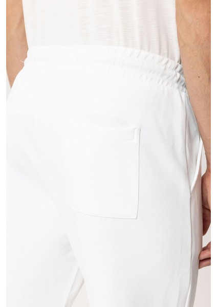 Beyaz Regular Fit Pamuklu Beli Bağlamalı Jogger Pantolon fırsatları