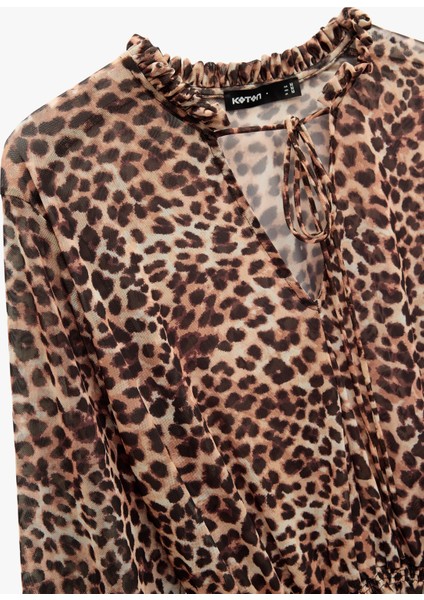 Rahat Kalıp Uzun Kollu Gipeli Bağlamalı Yaka Leopar Desenli Tül Bluz modelleri