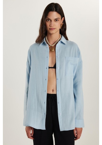 Kadın Oversize Geniş Kesim %100 Pamuk Müslin Kumaş Uzun Kollu Cepli Dokulu Mavi Gömlek