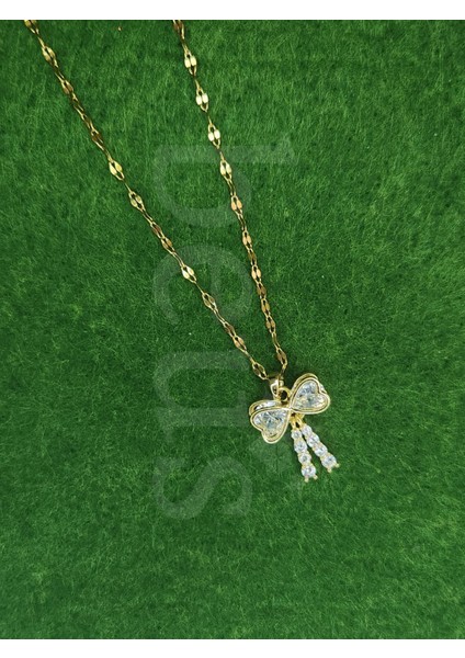 - Zirkon Taşlı Damla Detaylı Gold Kaplama Çelik Fiyonk Kolye fiyatları