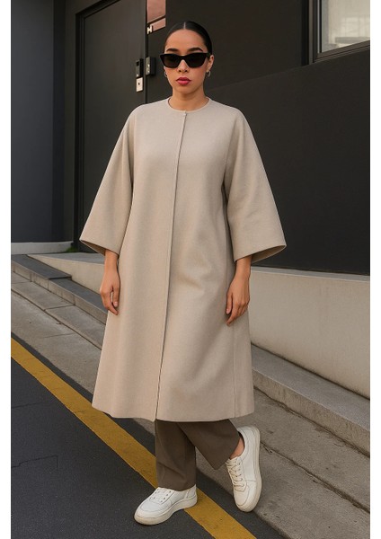 Kadın Trend Salaş Krem Kaşe Panço fırsatları