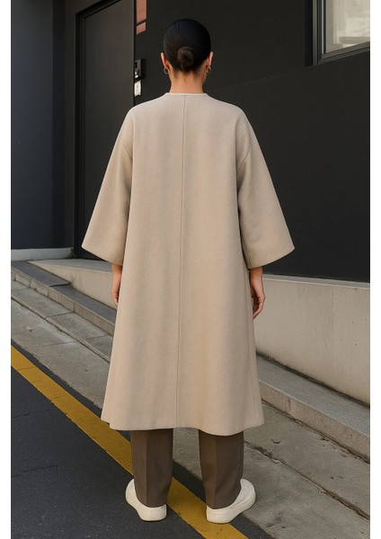 Kadın Trend Salaş Krem Kaşe Panço indirimleri