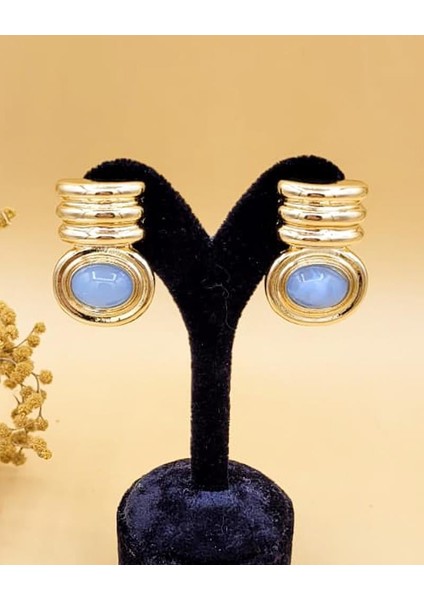 Bebe Mavisi Marka Model Pirinç Gold Küpe fırsatları