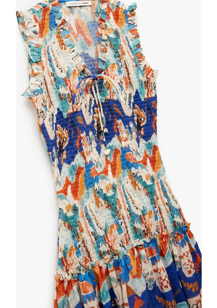 Etnik Desenli Bağlamalı Yaka Kolsuz Gipeli Fırfırlı Mini Elbise indirimleri