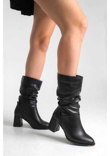 Siyah Deri Topuklu Kadın Bot Kaymaz Taban Kalın Topuk Laura modelleri