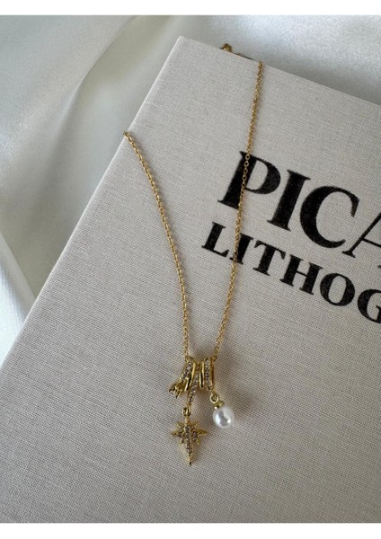 3 Charmlı Kuzey Yıldız Inci Topçuk Çelik Kolye fiyatları