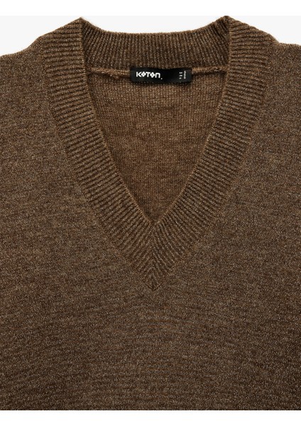 x Şahika Ercümen - Uzun Kollu V Yaka Triko Simli Oversize Kazak modelleri