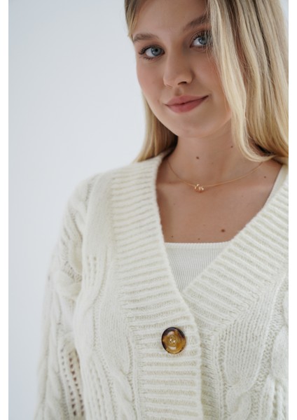 Kadın Kemik Oversize V Yaka Saç Örgülü Ajurlu Düğmeli Yün Karışımlı Triko Örme Uzun Hırka indirimleri