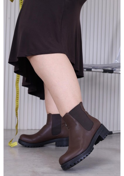 JUSTİN MODEL 3 TABANLI LASTİK DETAYLI KISA BOT KAHVE indirimleri