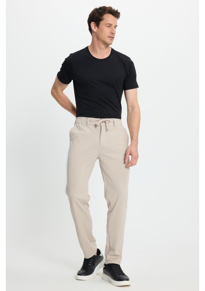 Erkek Slim Fit Dar Kesim Beli Lastikli Bağcık Detaylı Taş Pantolon fiyatları