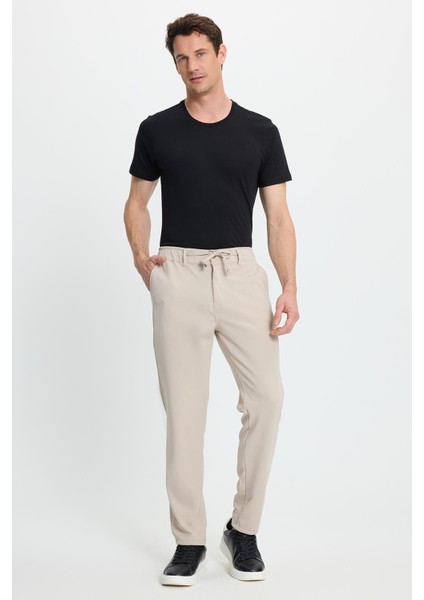 Erkek Slim Fit Dar Kesim Beli Lastikli Bağcık Detaylı Taş Pantolon modelleri