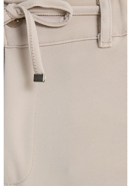 Erkek Slim Fit Dar Kesim Beli Lastikli Bağcık Detaylı Taş Pantolon