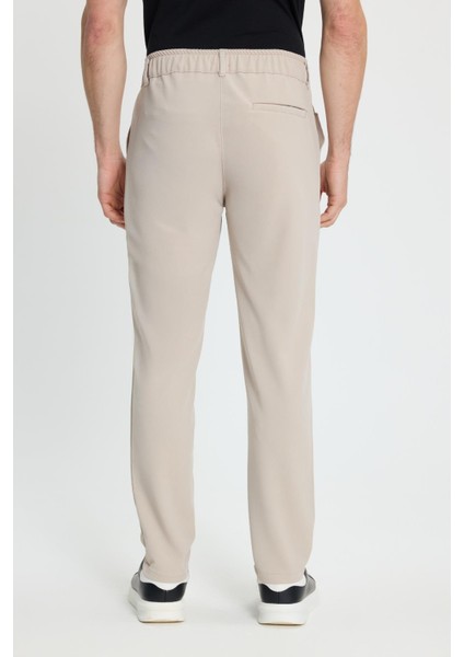 Erkek Slim Fit Dar Kesim Beli Lastikli Bağcık Detaylı Taş Pantolon