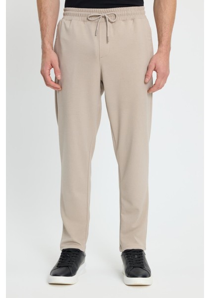Erkek Regular Fit Klasik Kesim Beli Lastikli Bağcıklı Bej Jogger Pantolon