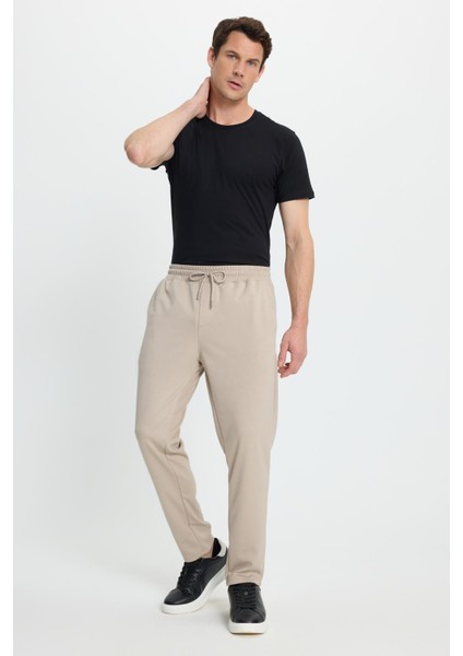 Erkek Regular Fit Klasik Kesim Beli Lastikli Bağcıklı Bej Jogger Pantolon fırsatları
