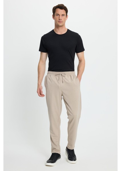 Erkek Regular Fit Klasik Kesim Beli Lastikli Bağcıklı Bej Jogger Pantolon indirimleri