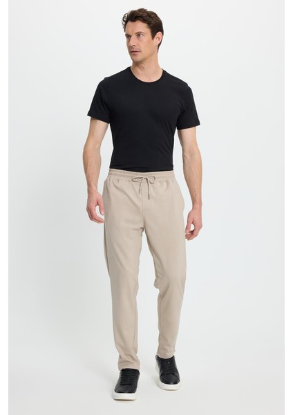 Erkek Regular Fit Klasik Kesim Beli Lastikli Bağcıklı Bej Jogger Pantolon fiyatları
