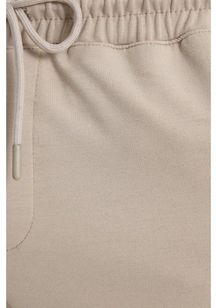 Erkek Regular Fit Klasik Kesim Beli Lastikli Bağcıklı Bej Jogger Pantolon modelleri