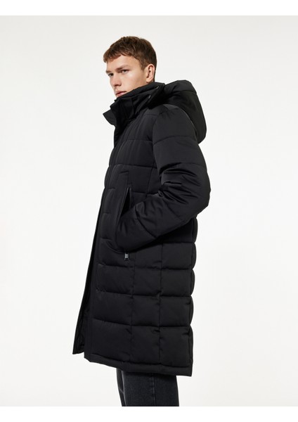 Uzun Kollu Cepli Kapşonlu Uzun Şişme Mont