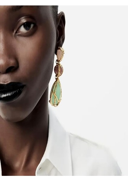 Trend Markaların Modeli Şık Sallantılı Geometrik Küpeler