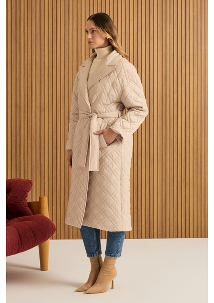 Seyyar Kuşaklı Kapitone Mont fırsatları