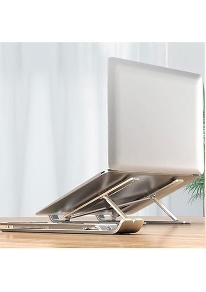 Taşınabilir Katlanabilir Folding Alüminyum Dizüstü Bilgisayar Standı Alüminyum Ayarlanabilir Açı ve Katlanabilir Portatif Rahat Kullanım 11 Inç 17 Inç Arası Kullanım Ev ve Ofis Gümüş ZR630 modelleri