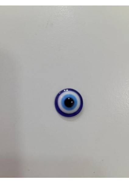 Boy Nazar Boncuğu – Düşük Kaliteli, Dayanıksız ve Yetersiz Performanslı Mini Nazar Boncuğu, Yuvarlak, Yapıştırmalık, 1-1,5 Cm, Lacivert-Beyaz-Mavi fiyatları