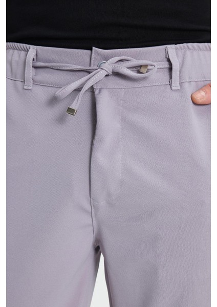 Erkek Slim Fit Dar Kesim Beli Lastikli Bağcık Detaylı Gri Pantolon modelleri