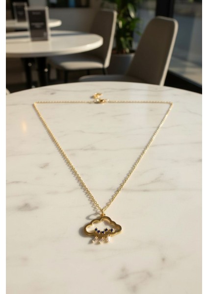 Bulut Figürlü Mavi Zirkon ve Baget Taşlı 14 Ayar Altın Kolye fiyatları