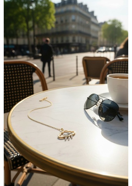 Bulut Figürlü Mavi Zirkon ve Baget Taşlı 14 Ayar Altın Kolye modelleri