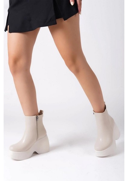 Kadın Celsi Krem Cilt Yandan Fermuarlı 9 cm Yüksek Dolgu Topuklu Mevsimlik Kadın Kısa Bot Bootie fiyatları