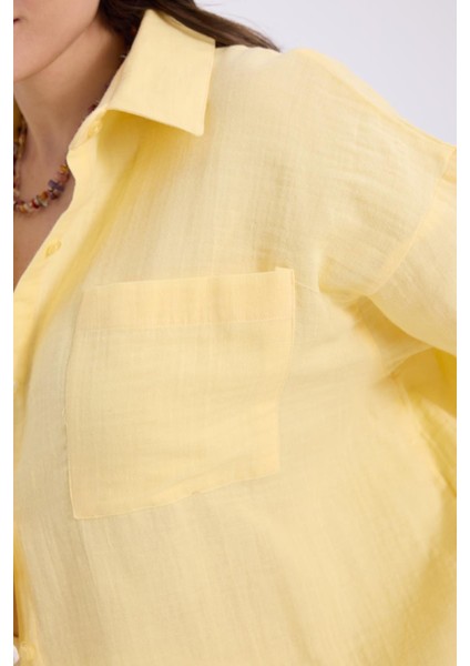 Kadın Oversize Geniş Kesim %100 Pamuk Müslin Kumaş Uzun Kollu Cepli Dokulu Sarı Gömlek modelleri