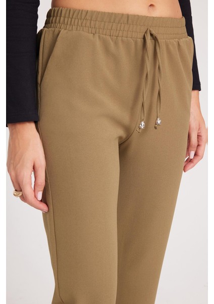 Kadın Relax Fit Rahat Kesim Yüksel Bel Dar Paça Beli Lastikli Bağcıklı haki Pantolon modelleri