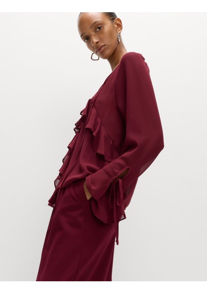 Fiyonklu Yaka Volanlı Bluz fiyatları