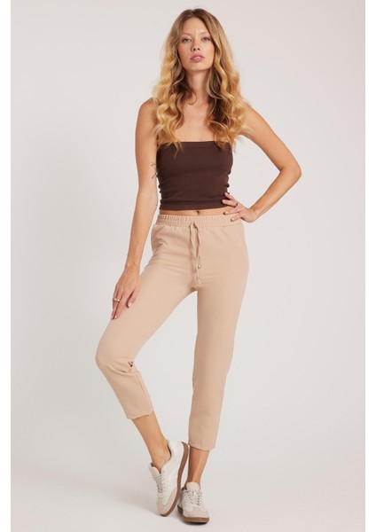 Kadın Relax Fit Rahat Kesim Yüksel Bel Dar Paça Beli Lastikli Bağcıklı açık Bej Pantolon fiyatları