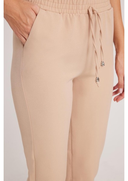 Kadın Relax Fit Rahat Kesim Yüksel Bel Dar Paça Beli Lastikli Bağcıklı açık Bej Pantolon modelleri