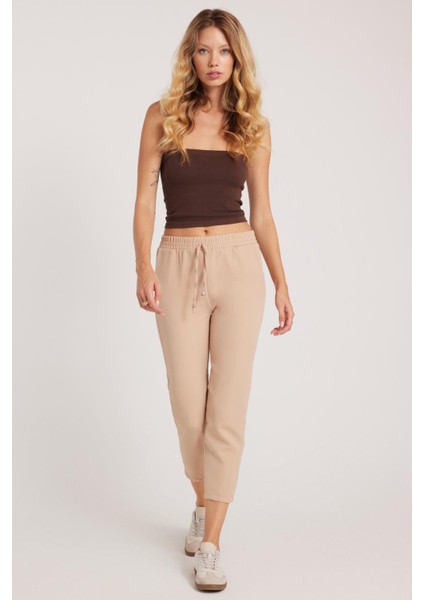 Kadın Relax Fit Rahat Kesim Yüksel Bel Dar Paça Beli Lastikli Bağcıklı açık Bej Pantolon fırsatları
