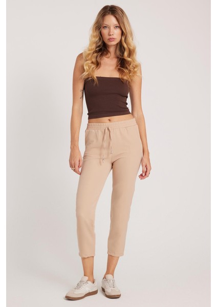 Kadın Relax Fit Rahat Kesim Yüksel Bel Dar Paça Beli Lastikli Bağcıklı açık Bej Pantolon indirimleri