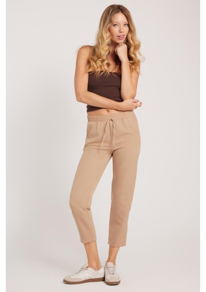 Kadın Relax Fit Rahat Kesim Yüksel Bel Dar Paça Beli Lastikli Bağcıklı bej Pantolon fırsatları