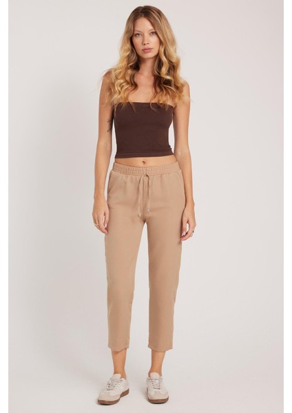 Kadın Relax Fit Rahat Kesim Yüksel Bel Dar Paça Beli Lastikli Bağcıklı bej Pantolon indirimleri