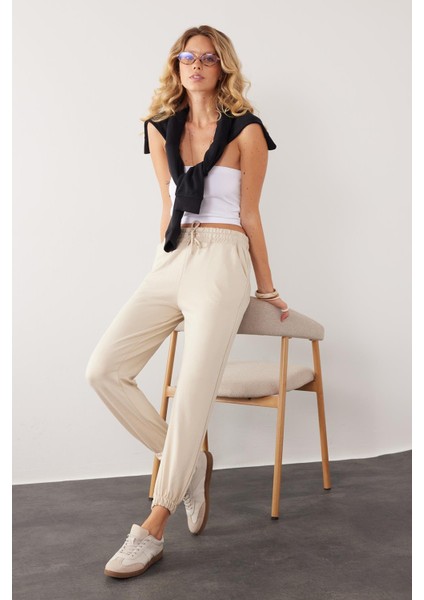 Kadın Relax Fit Rahat Kesim Modal Kumaş Beli Bağlamalı Lastikli Jogger Taş Pantolon fiyatları