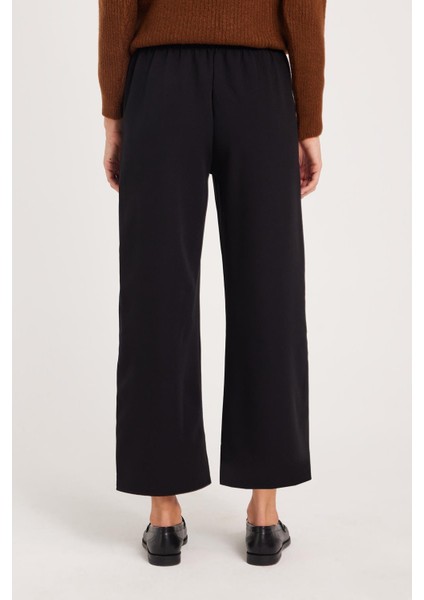 Kadın Relax Fit Rahat Kesim Lastikli Kuşak Bağlamalı Geniş Paça Siyah Pantolon