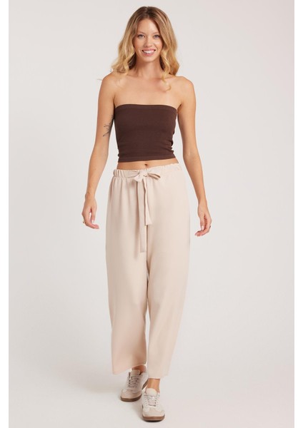 Kadın Relax Fit Rahat Kesim Lastikli Kuşak Bağlamalı Geniş Paça Açık Bej Pantolon fiyatları