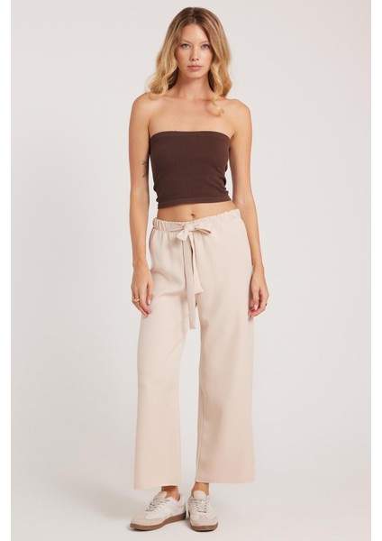 Kadın Relax Fit Rahat Kesim Lastikli Kuşak Bağlamalı Geniş Paça Açık Bej Pantolon fırsatları