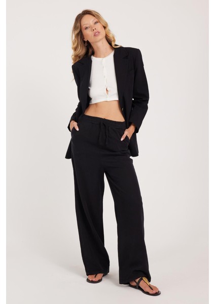Kadın Regular Fit Klasik Kesim Pamuklu Geniş Paça Siyah Pantolon indirimleri