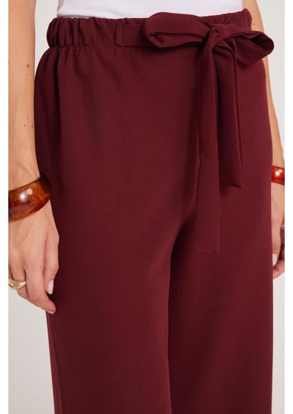 Kadın Relax Fit Rahat Kesim Lastikli Kuşak Bağlamalı Geniş Paça Bordo Pantolon modelleri
