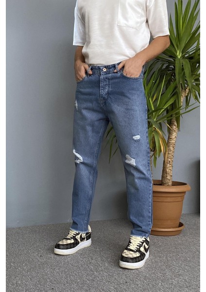 Paçaları Yırtık Detaylı Mavi Jean - Kot Pantolon