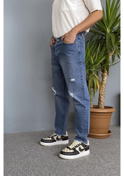 Paçaları Yırtık Detaylı Mavi Jean - Kot Pantolon modelleri