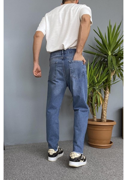 Paçaları Yırtık Detaylı Mavi Jean - Kot Pantolon indirimleri